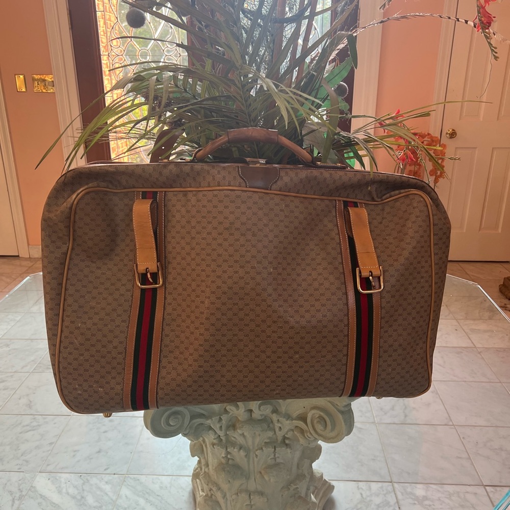 Authentic Gucci luggage